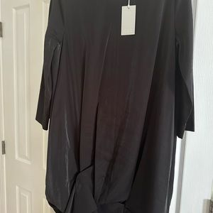 Cos dress. Black. Back closure. Over knee.